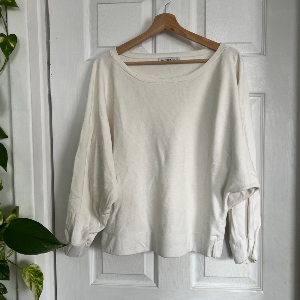 Slouchy white knit sweater from Zara